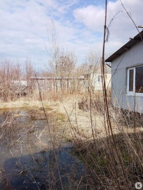 В посёлке Карамышево Озёрского района 12 жилых домов уже с осени заливает грунтовыми водами